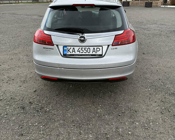 Серый Опель Инсигния, объемом двигателя 2 л и пробегом 260 тыс. км за 6700 $, фото 4 на Automoto.ua