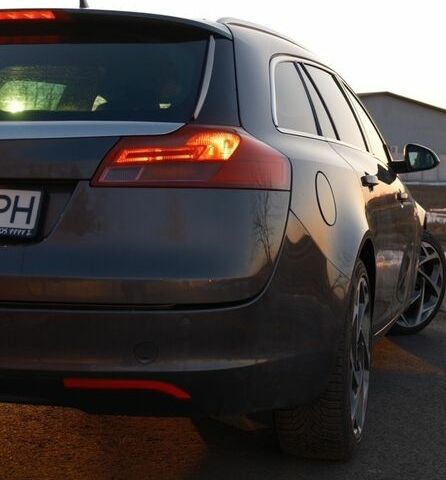 Серый Опель Инсигния, объемом двигателя 1.96 л и пробегом 290 тыс. км за 6600 $, фото 4 на Automoto.ua