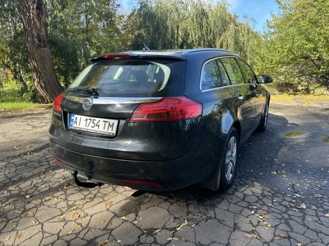 Сірий Опель Інсігнія, об'ємом двигуна 2 л та пробігом 270 тис. км за 5956 $, фото 6 на Automoto.ua