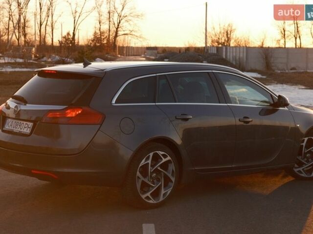 Серый Опель Инсигния, объемом двигателя 1.96 л и пробегом 290 тыс. км за 6600 $, фото 2 на Automoto.ua