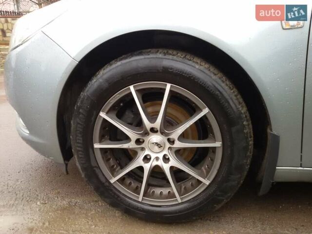 Сірий Опель Інсігнія, об'ємом двигуна 2 л та пробігом 220 тис. км за 8300 $, фото 8 на Automoto.ua