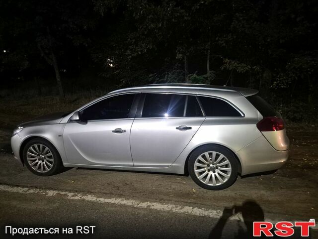 Серый Опель Инсигния, объемом двигателя 2 л и пробегом 280 тыс. км за 7500 $, фото 2 на Automoto.ua