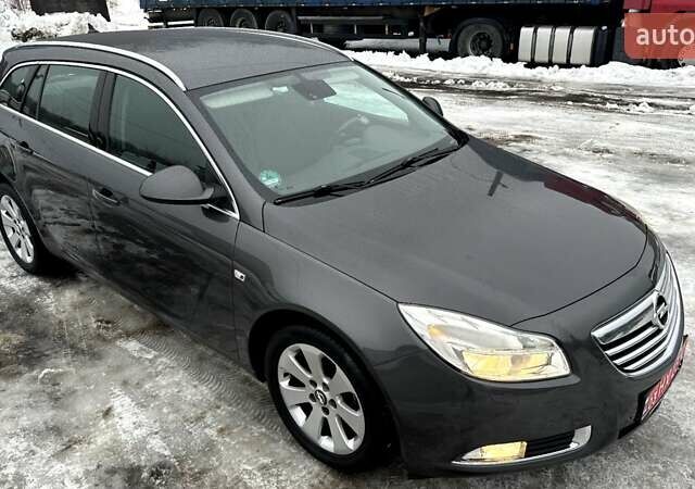 Серый Опель Инсигния, объемом двигателя 1.8 л и пробегом 190 тыс. км за 7550 $, фото 4 на Automoto.ua