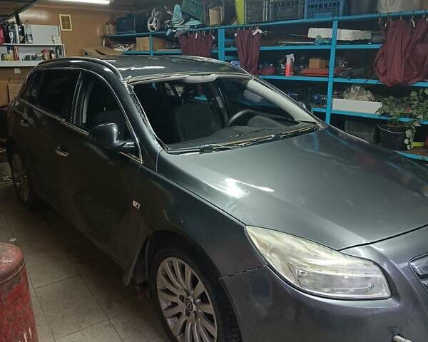 Серый Опель Инсигния, объемом двигателя 1.96 л и пробегом 190 тыс. км за 4000 $, фото 1 на Automoto.ua