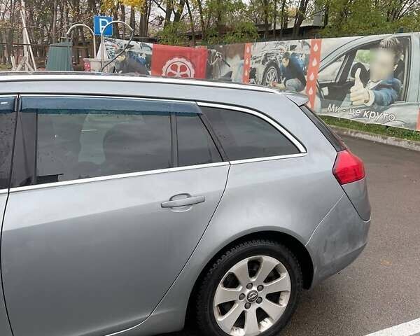 Серый Опель Инсигния, объемом двигателя 1.96 л и пробегом 297 тыс. км за 7400 $, фото 14 на Automoto.ua