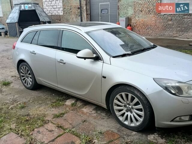 Серый Опель Инсигния, объемом двигателя 1.96 л и пробегом 238 тыс. км за 8400 $, фото 2 на Automoto.ua