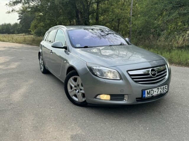 Серый Опель Инсигния, объемом двигателя 2 л и пробегом 166 тыс. км за 5600 $, фото 1 на Automoto.ua
