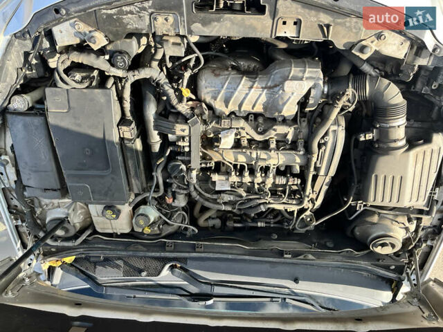 Серый Опель Инсигния, объемом двигателя 2 л и пробегом 287 тыс. км за 7400 $, фото 16 на Automoto.ua