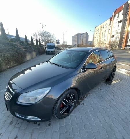 Серый Опель Инсигния, объемом двигателя 1.96 л и пробегом 218 тыс. км за 7350 $, фото 2 на Automoto.ua