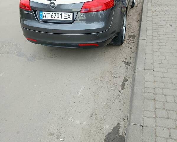 Серый Опель Инсигния, объемом двигателя 2 л и пробегом 243 тыс. км за 7600 $, фото 2 на Automoto.ua