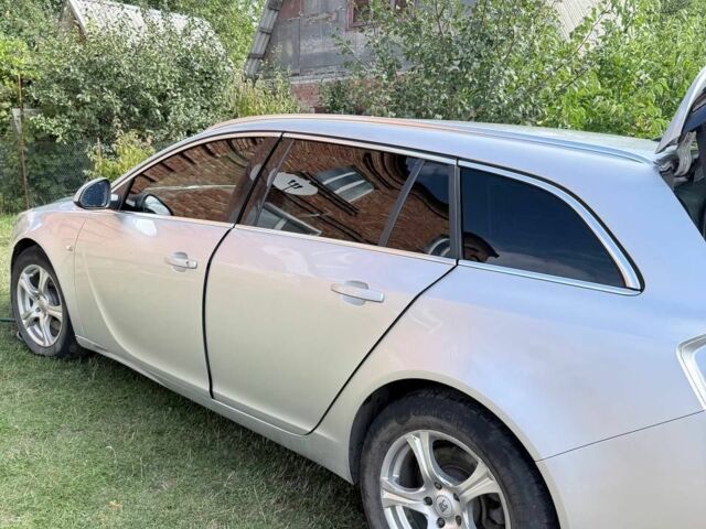 Сірий Опель Інсігнія, об'ємом двигуна 2 л та пробігом 246 тис. км за 7514 $, фото 5 на Automoto.ua