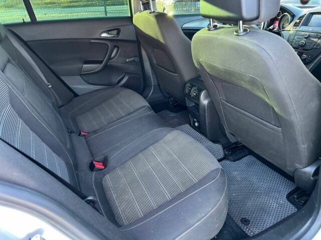 Серый Опель Инсигния, объемом двигателя 2 л и пробегом 323 тыс. км за 6300 $, фото 4 на Automoto.ua