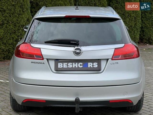 Серый Опель Инсигния, объемом двигателя 2 л и пробегом 249 тыс. км за 6999 $, фото 5 на Automoto.ua