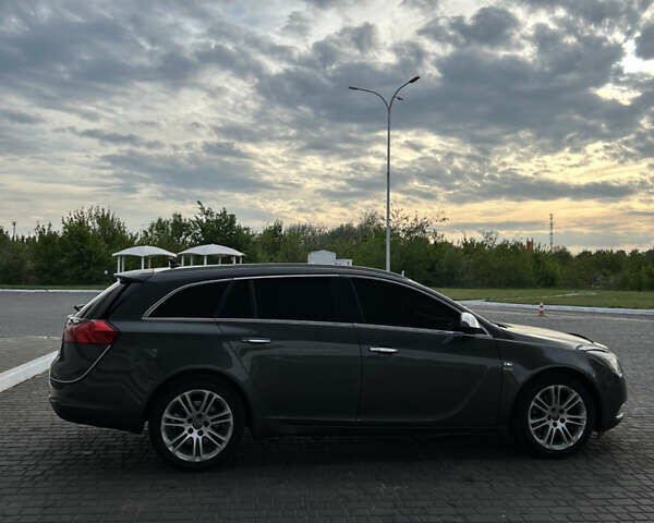 Сірий Опель Інсігнія, об'ємом двигуна 2 л та пробігом 256 тис. км за 7600 $, фото 6 на Automoto.ua