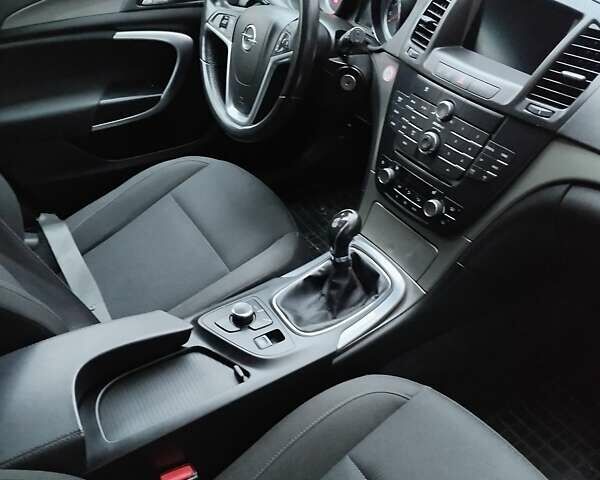 Серый Опель Инсигния, объемом двигателя 1.96 л и пробегом 241 тыс. км за 6450 $, фото 1 на Automoto.ua