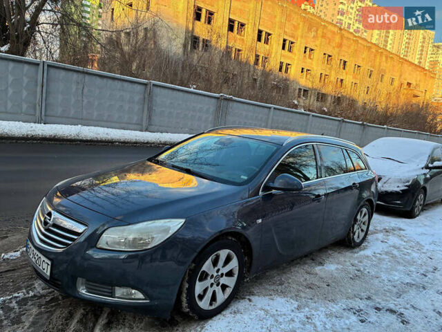 Серый Опель Инсигния, объемом двигателя 2 л и пробегом 325 тыс. км за 6340 $, фото 1 на Automoto.ua