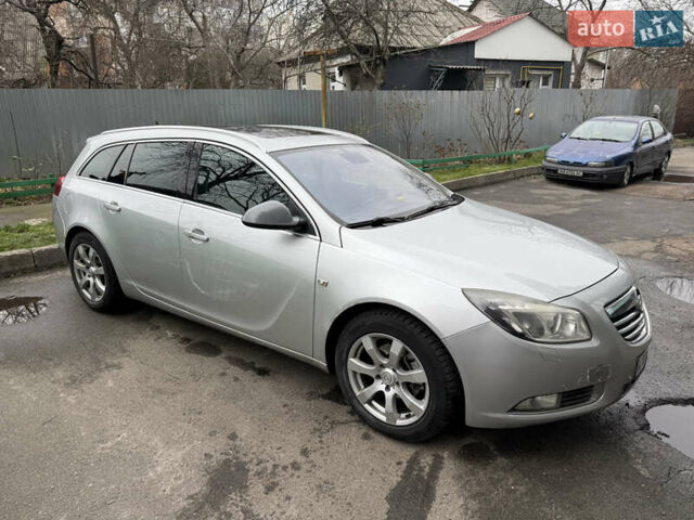 Серый Опель Инсигния, объемом двигателя 1.96 л и пробегом 303 тыс. км за 7400 $, фото 1 на Automoto.ua