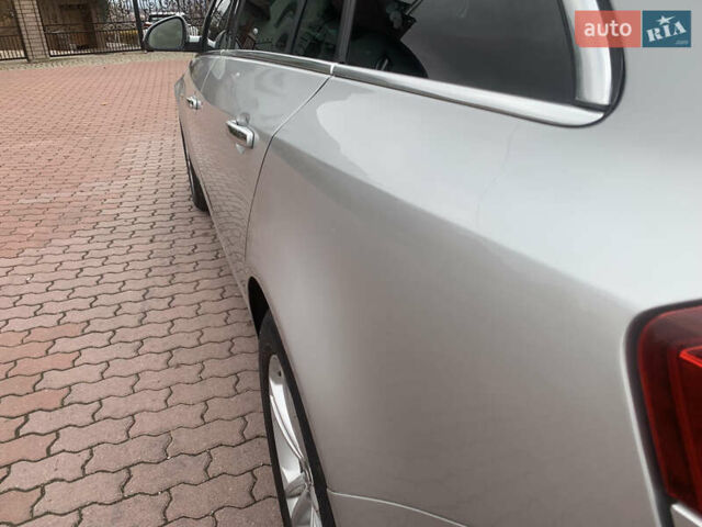 Сірий Опель Інсігнія, об'ємом двигуна 2 л та пробігом 215 тис. км за 7350 $, фото 19 на Automoto.ua