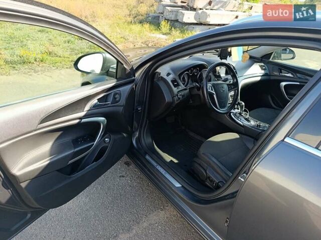 Серый Опель Инсигния, объемом двигателя 1.96 л и пробегом 260 тыс. км за 7000 $, фото 5 на Automoto.ua