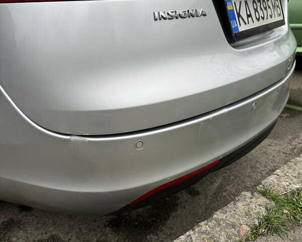 Серый Опель Инсигния, объемом двигателя 1.96 л и пробегом 303 тыс. км за 7400 $, фото 13 на Automoto.ua