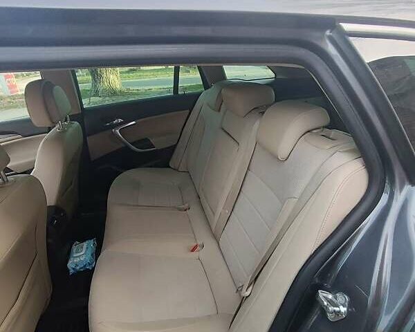 Сірий Опель Інсігнія, об'ємом двигуна 1.96 л та пробігом 240 тис. км за 7600 $, фото 1 на Automoto.ua