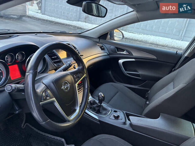 Серый Опель Инсигния, объемом двигателя 2 л и пробегом 325 тыс. км за 6340 $, фото 13 на Automoto.ua