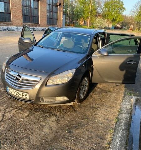 Серый Опель Инсигния, объемом двигателя 2 л и пробегом 310 тыс. км за 8500 $, фото 3 на Automoto.ua