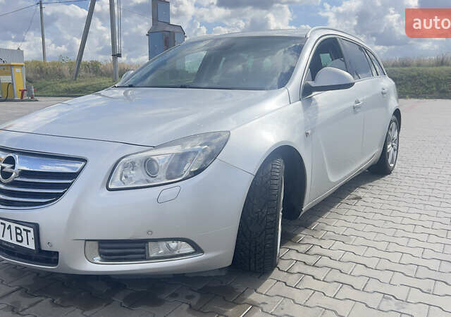 Серый Опель Инсигния, объемом двигателя 1.96 л и пробегом 216 тыс. км за 7300 $, фото 5 на Automoto.ua