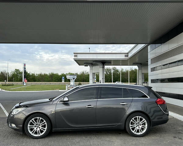 Сірий Опель Інсігнія, об'ємом двигуна 2 л та пробігом 256 тис. км за 7600 $, фото 2 на Automoto.ua