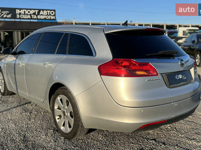 Серый Опель Инсигния, объемом двигателя 2 л и пробегом 323 тыс. км за 6900 $, фото 4 на Automoto.ua