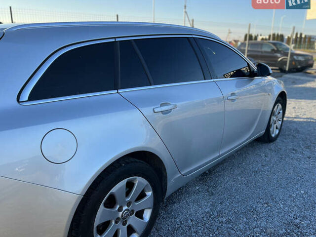 Серый Опель Инсигния, объемом двигателя 2 л и пробегом 323 тыс. км за 6900 $, фото 7 на Automoto.ua