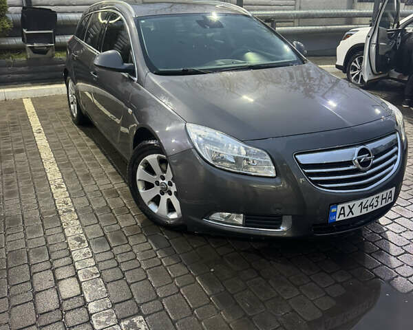 Серый Опель Инсигния, объемом двигателя 2 л и пробегом 237 тыс. км за 8299 $, фото 7 на Automoto.ua