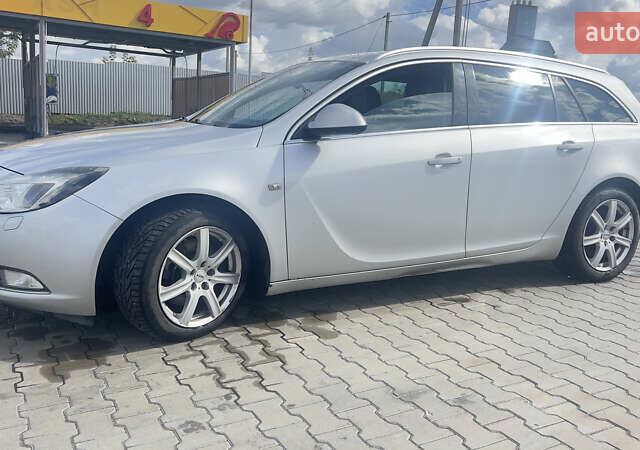 Серый Опель Инсигния, объемом двигателя 1.96 л и пробегом 216 тыс. км за 7300 $, фото 6 на Automoto.ua