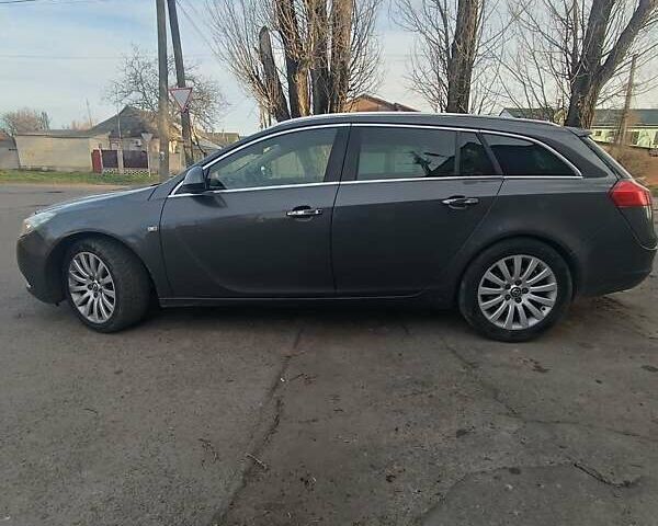 Сірий Опель Інсігнія, об'ємом двигуна 1.96 л та пробігом 240 тис. км за 7600 $, фото 3 на Automoto.ua