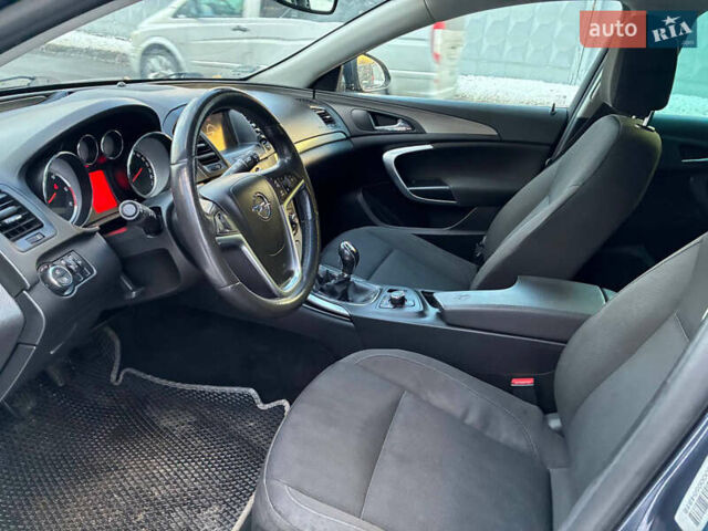 Серый Опель Инсигния, объемом двигателя 2 л и пробегом 325 тыс. км за 6340 $, фото 9 на Automoto.ua