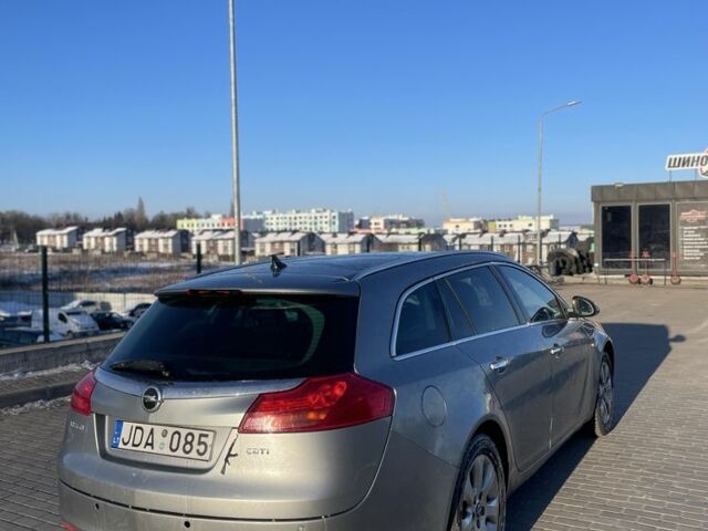 Серый Опель Инсигния, объемом двигателя 2 л и пробегом 320 тыс. км за 3999 $, фото 4 на Automoto.ua