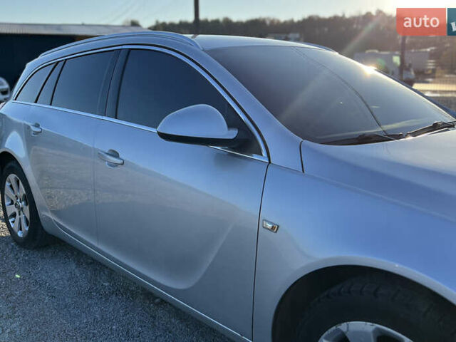 Серый Опель Инсигния, объемом двигателя 2 л и пробегом 323 тыс. км за 6900 $, фото 3 на Automoto.ua