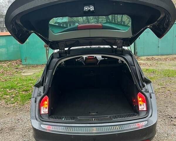 Серый Опель Инсигния, объемом двигателя 2 л и пробегом 299 тыс. км за 6700 $, фото 4 на Automoto.ua