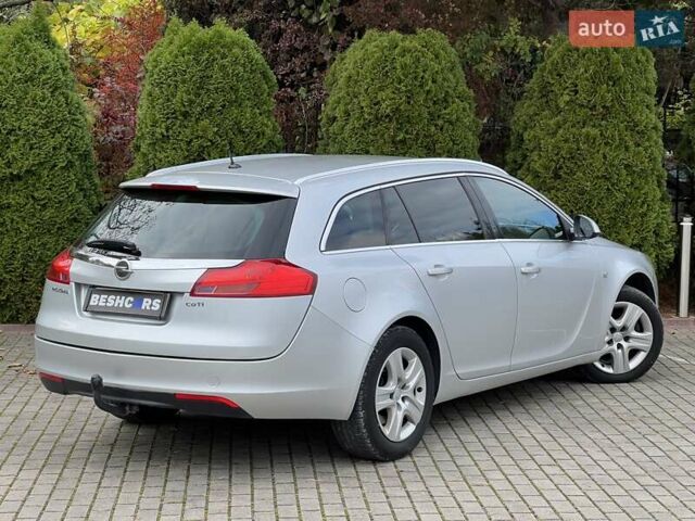 Серый Опель Инсигния, объемом двигателя 2 л и пробегом 249 тыс. км за 6999 $, фото 4 на Automoto.ua