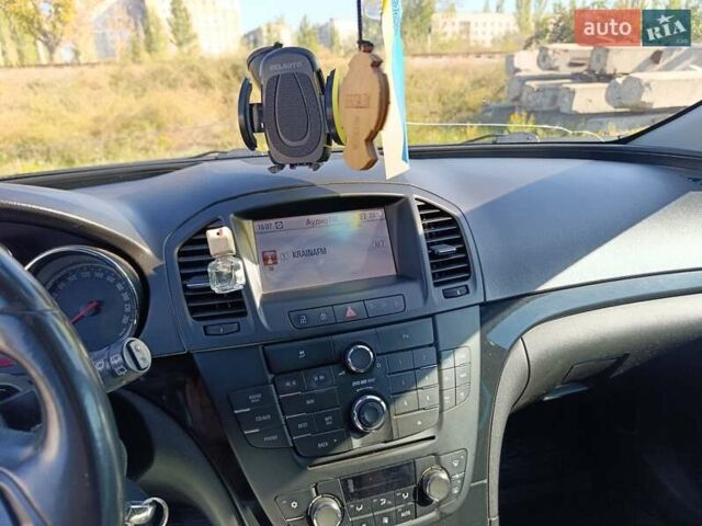 Серый Опель Инсигния, объемом двигателя 1.96 л и пробегом 260 тыс. км за 7000 $, фото 1 на Automoto.ua