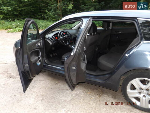 Серый Опель Инсигния, объемом двигателя 2 л и пробегом 320 тыс. км за 8600 $, фото 9 на Automoto.ua