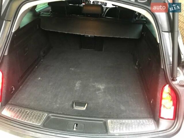 Серый Опель Инсигния, объемом двигателя 2 л и пробегом 278 тыс. км за 10000 $, фото 5 на Automoto.ua