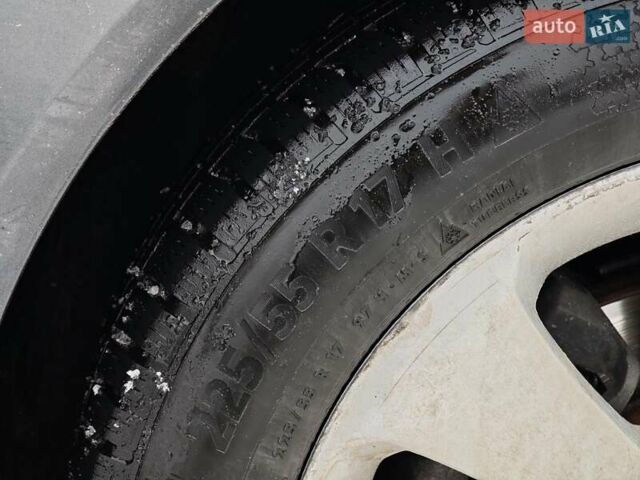 Серый Опель Инсигния, объемом двигателя 2 л и пробегом 240 тыс. км за 7990 $, фото 6 на Automoto.ua