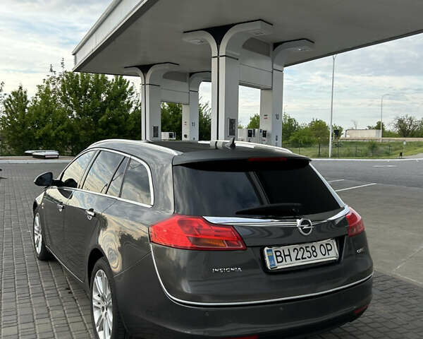 Сірий Опель Інсігнія, об'ємом двигуна 2 л та пробігом 256 тис. км за 7600 $, фото 3 на Automoto.ua