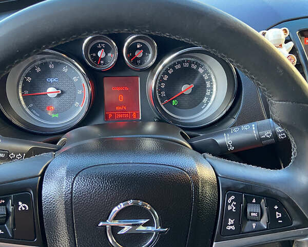 Серый Опель Инсигния, объемом двигателя 1.96 л и пробегом 312 тыс. км за 8700 $, фото 6 на Automoto.ua