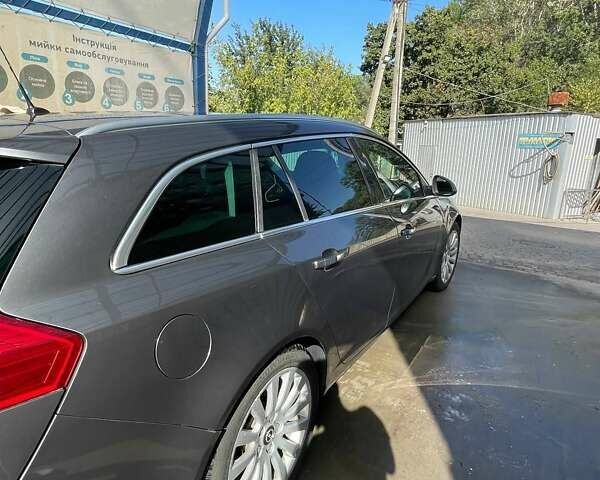 Серый Опель Инсигния, объемом двигателя 1.96 л и пробегом 284 тыс. км за 8900 $, фото 3 на Automoto.ua