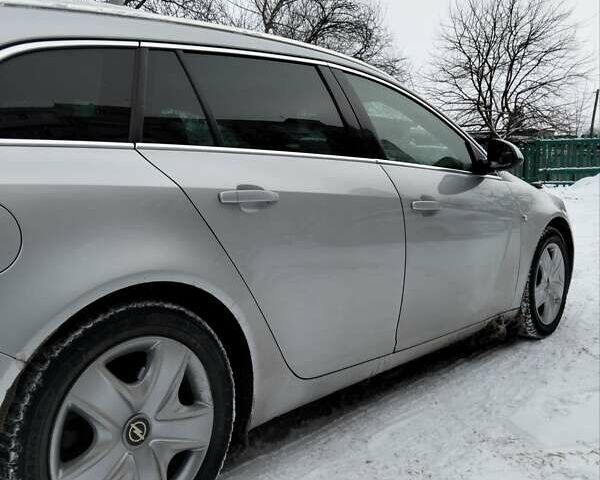 Сірий Опель Інсігнія, об'ємом двигуна 1.96 л та пробігом 300 тис. км за 7050 $, фото 2 на Automoto.ua