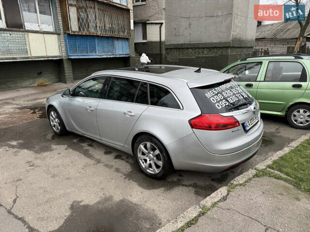 Серый Опель Инсигния, объемом двигателя 1.96 л и пробегом 303 тыс. км за 7400 $, фото 2 на Automoto.ua