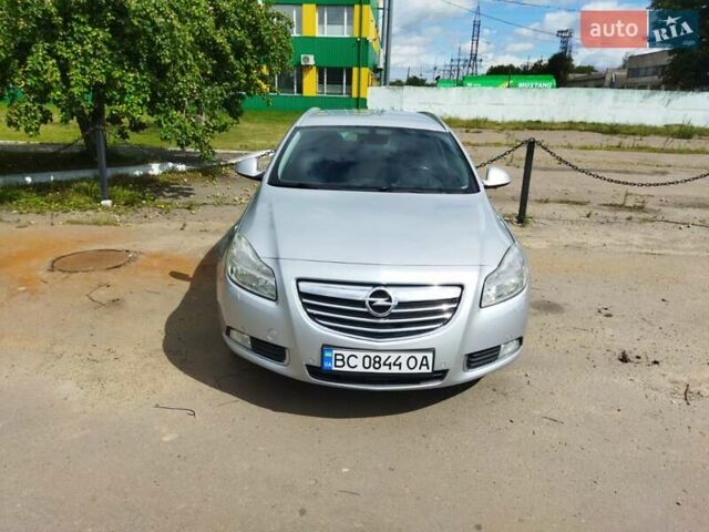 Серый Опель Инсигния, объемом двигателя 2 л и пробегом 282 тыс. км за 7900 $, фото 6 на Automoto.ua