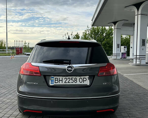 Сірий Опель Інсігнія, об'ємом двигуна 2 л та пробігом 256 тис. км за 7600 $, фото 4 на Automoto.ua